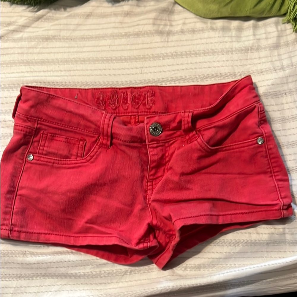Vibrant Red Jean Shorts with Distressed Look